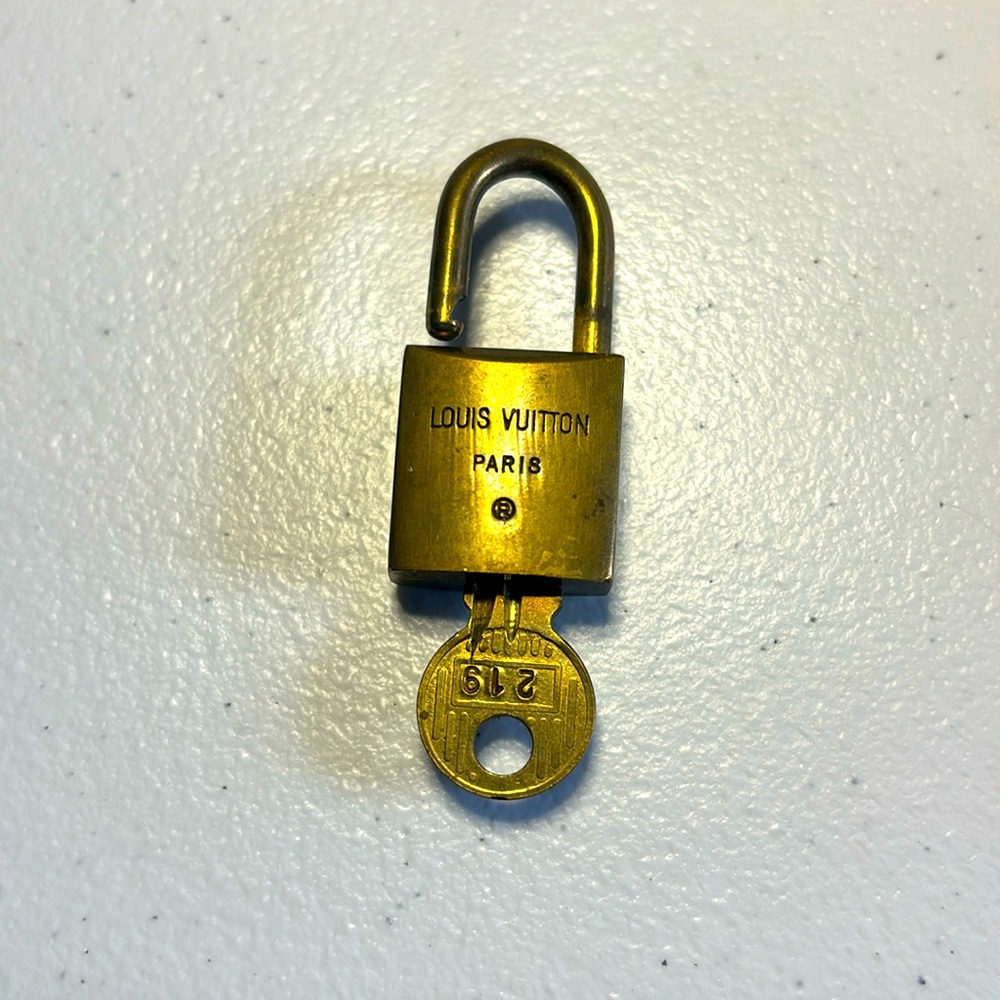 Authentic Louis Vuitton key and lock